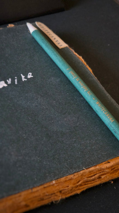 Green eco friendly journal and a green royal vintage pencil with gold print on it by White Canvaa.
