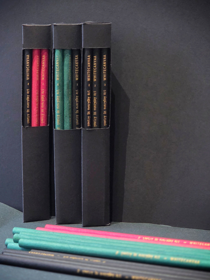 Three set of eco friendly newspaper pencils in a black paper box with 6 pencils in each box. White Canvaa Delhi